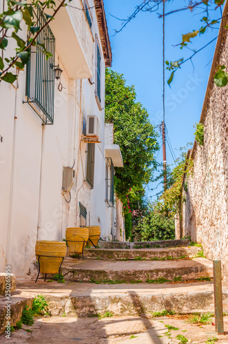 Fototapeta Naklejka Na Ścianę i Meble -  Traditional cozy greek street in city Nafplio, Greece