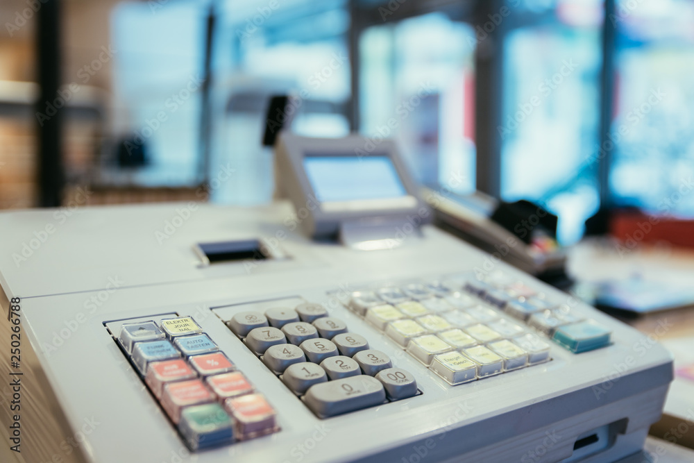 Cash register in a store, sales; Blurry Background Cash register in a store, sales; Blurry Background