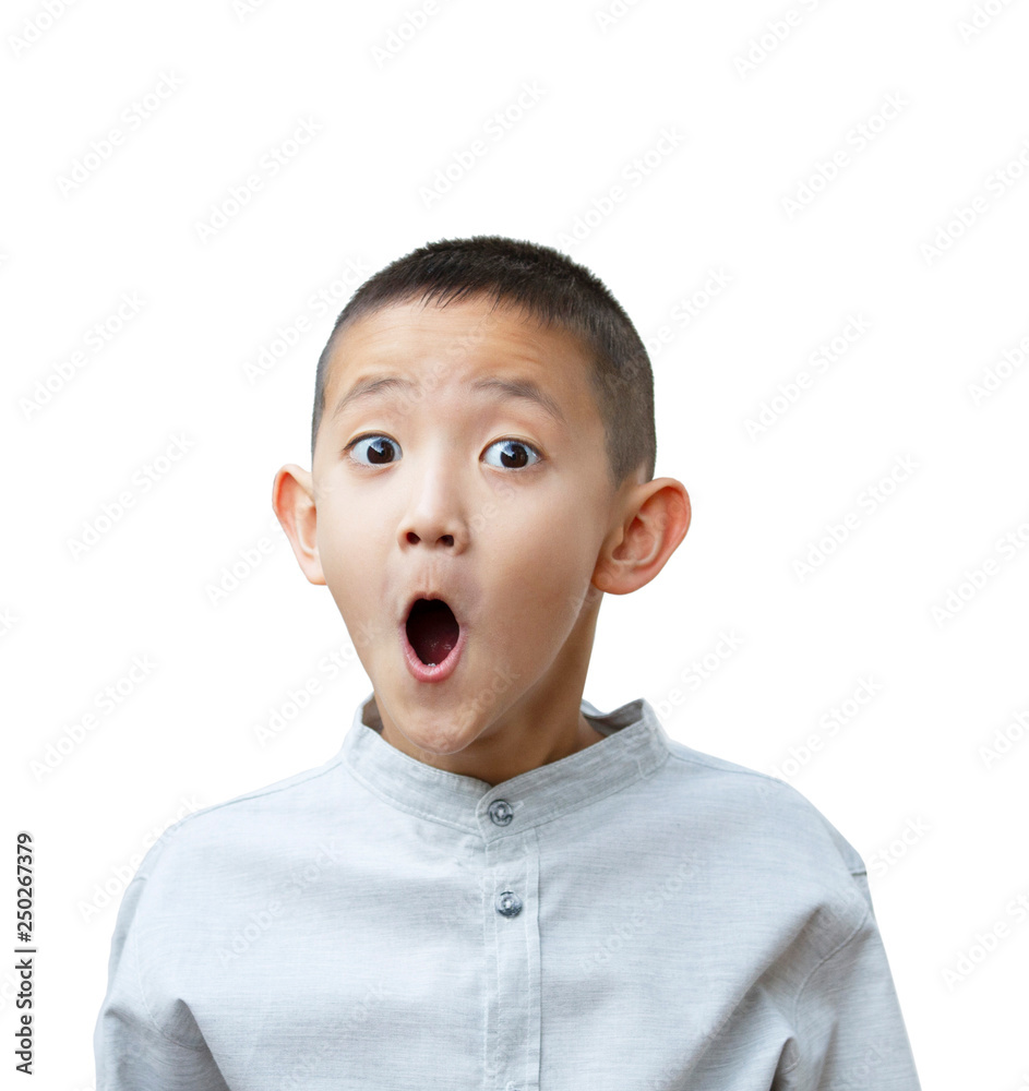 Asian boy looking surprised with mouth open Asian boy looking surprised with mouth open