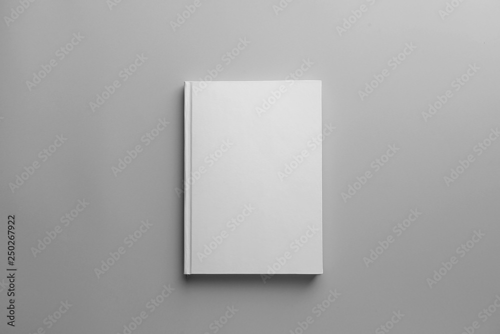 Book with blank cover on light background Book with blank cover on light background