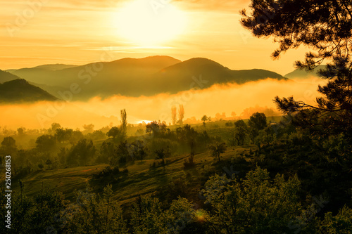 Foggy sunrise over Rodopi mountain, Bulgaria. Mountain landscape