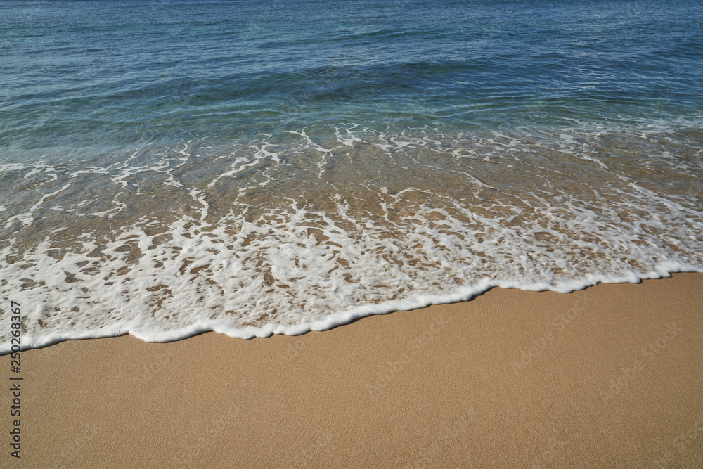 sand and wave bubbles with clear sea in day time sand and wave bubbles with clear sea in day time