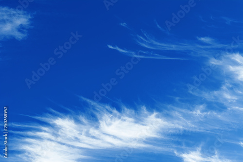 Clouds of unusual shape in the blue sky