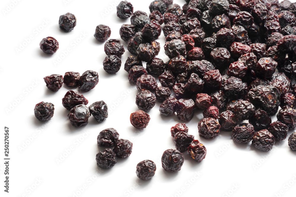 Heap of dried cherries with bone isolated on white Heap of dried cherries with bone isolated on white