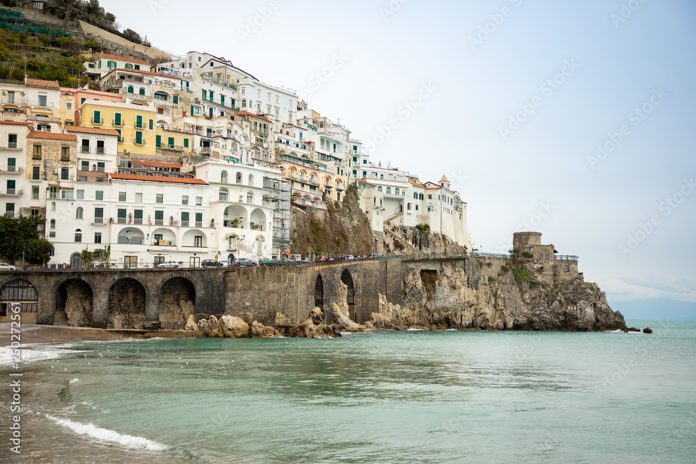 View of Amalfi cityscape on coast line of mediterranean sea in winter time, Italy