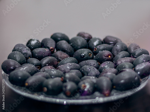 A Plate of Fresh Black Plum