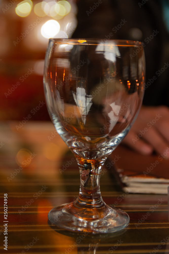 wine glass in ambient environment beautiful reflections and bokeh wine glass in ambient environment beautiful reflections and bokeh