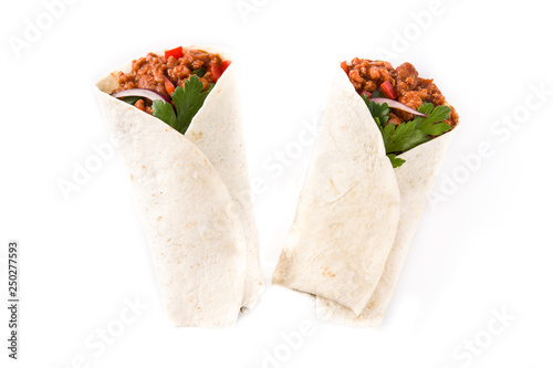 Typical Mexican burritos wraps with beef, frijoles and vegetables isolated on white background. Top view