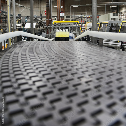 Close up of conveyor belt in bottling plant