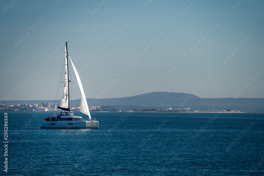 Sailing yacht boat in Lisbon. Luxury vacation.
