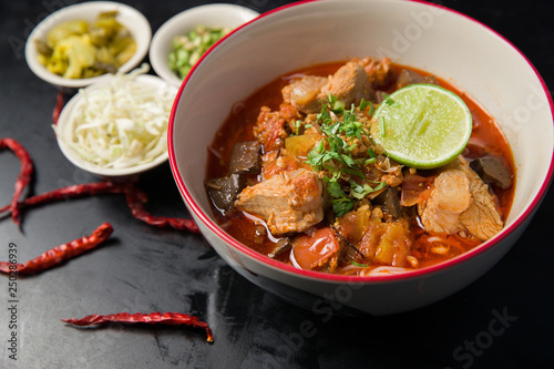 Nam Nguan Noodle is Rice noodles with spicy pork sauce