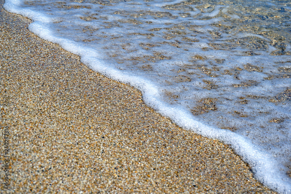 Geometric composition created by the waves of the sea in the Cyclades Islands Geometric composition created by the waves of the sea in the Cyclades Islands