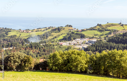 Meadows in rural village in the spanish basque country in a sunny day. photo