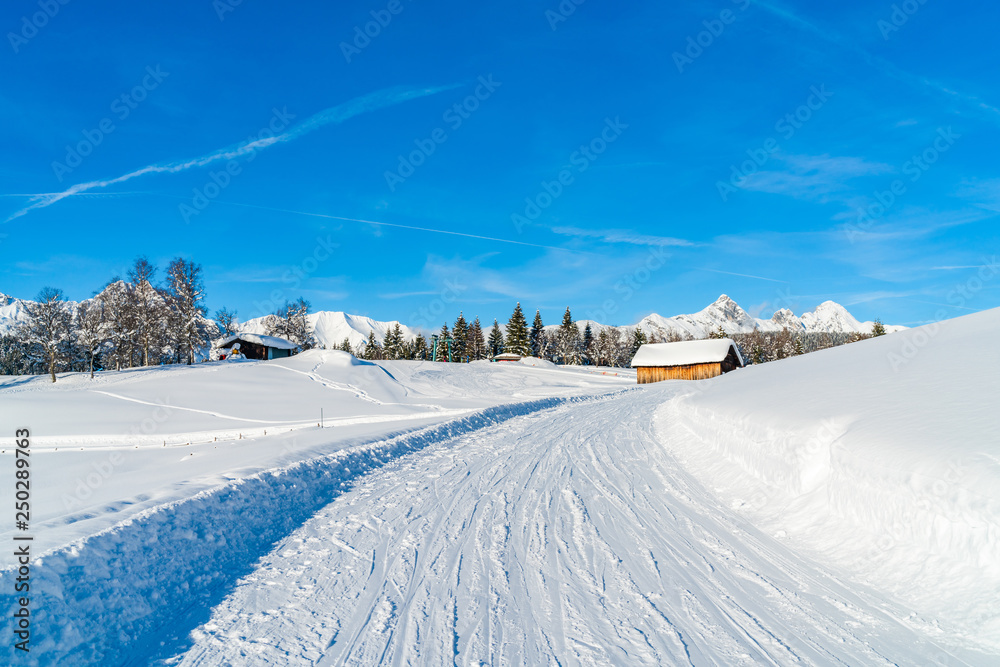 Winter landscape with with snow covered Alps in Seefeld in the Austrian state of Tyrol. Winter in Austria Winter landscape with with snow covered Alps in Seefeld in the Austrian state of Tyrol. Winter in Austria