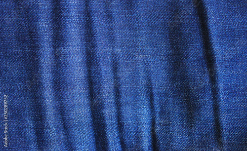 Jeans Texture Dark Blue Denim Background. Natural Crumbled Worn Pattern Fabric of Casual Classic Denim Jean Clothes. Vibrant Blue Apparel Detail Close Up Top View Wallpaper