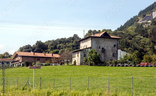 Meadows in rural village in the spanish basque country in a sunny day. photo