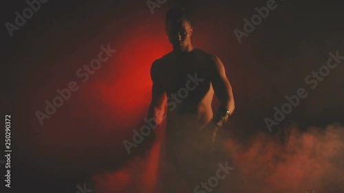 Silhouette of a dancing sexy man