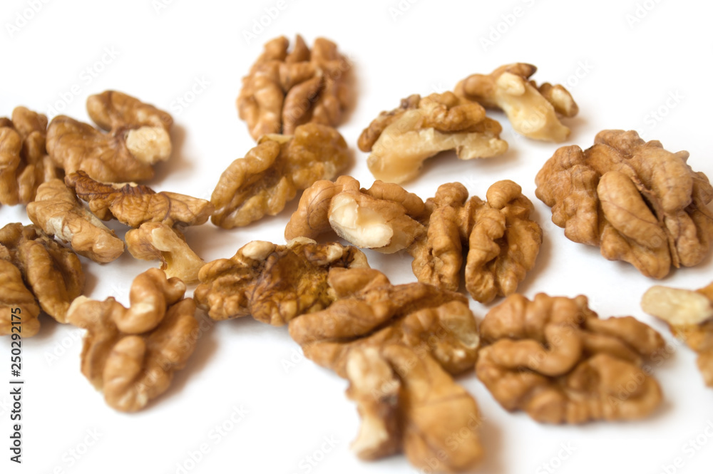 walnuts on a white background. banner about diet and healthy eating walnuts on a white background. banner about diet and healthy eating