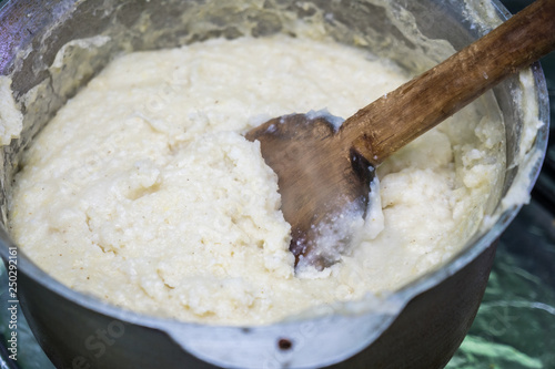 Ghomi, popular dish from Samegrelo region made of white coarse cornmeal, in big kettle photo