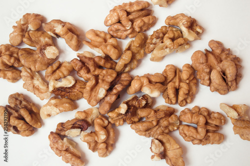  walnuts on a white background. banner about diet and healthy eating