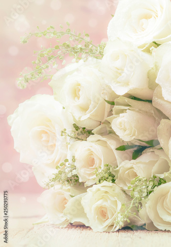 Bouquet of white roses for women's day or wedding, pastel colors, selective focus