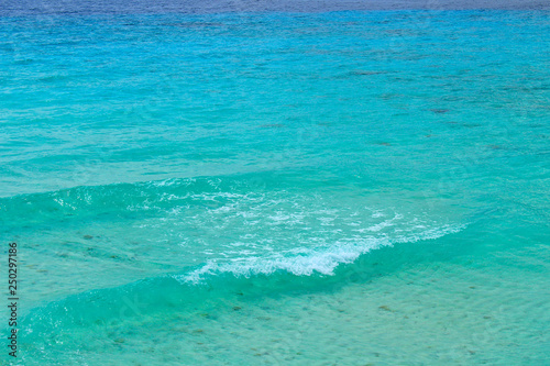 Bokeh turquoise sea water on Philippines. Natural marine background