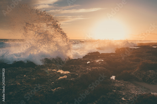 Amazing beach sunset with beautiful sunset and incredible foamy waves