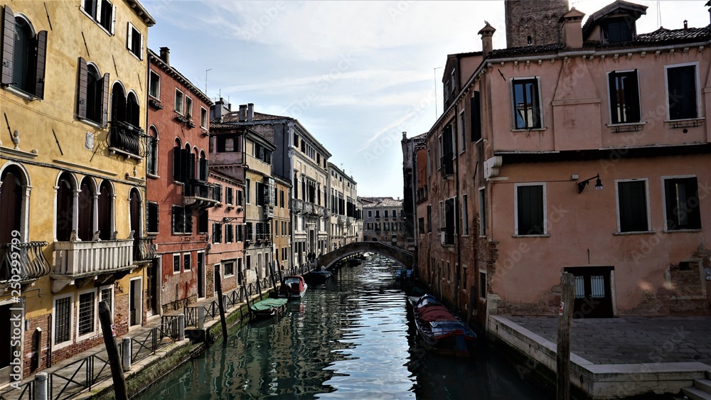 Canal and venetian houses in its typical architecture in Venice, Italy.