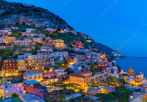 Panoramic view of the beach anf colorful buildings in Positano at Amalfi Coast, Italy.