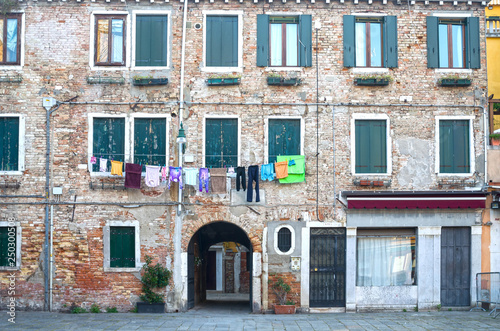 typical italian house with outside hanging laundry