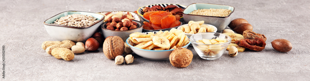 dried fruits and assorted nuts composition on rustic table dried fruits and assorted nuts composition on rustic table