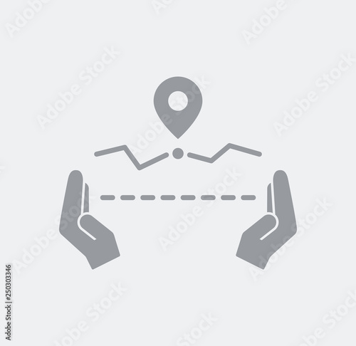 Hands measuring a trip distance