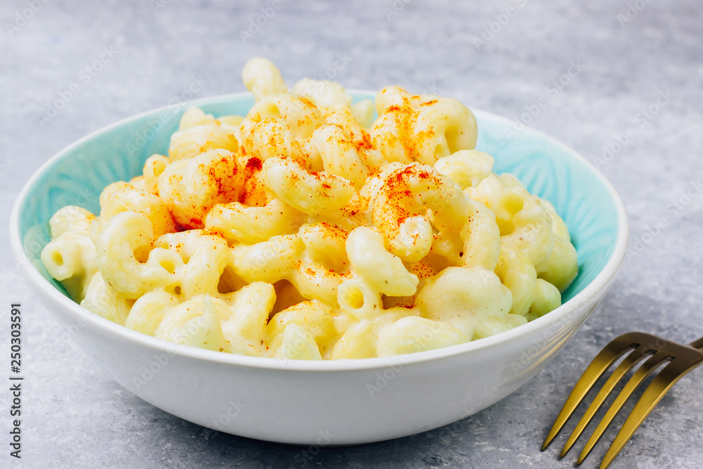 Mac and cheese, american style macaroni pasta with cheesy sauce Mac and cheese, american style macaroni pasta with cheesy sauce