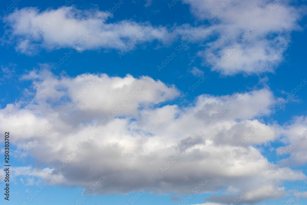blue sky background with tiny clouds blue sky background with tiny clouds