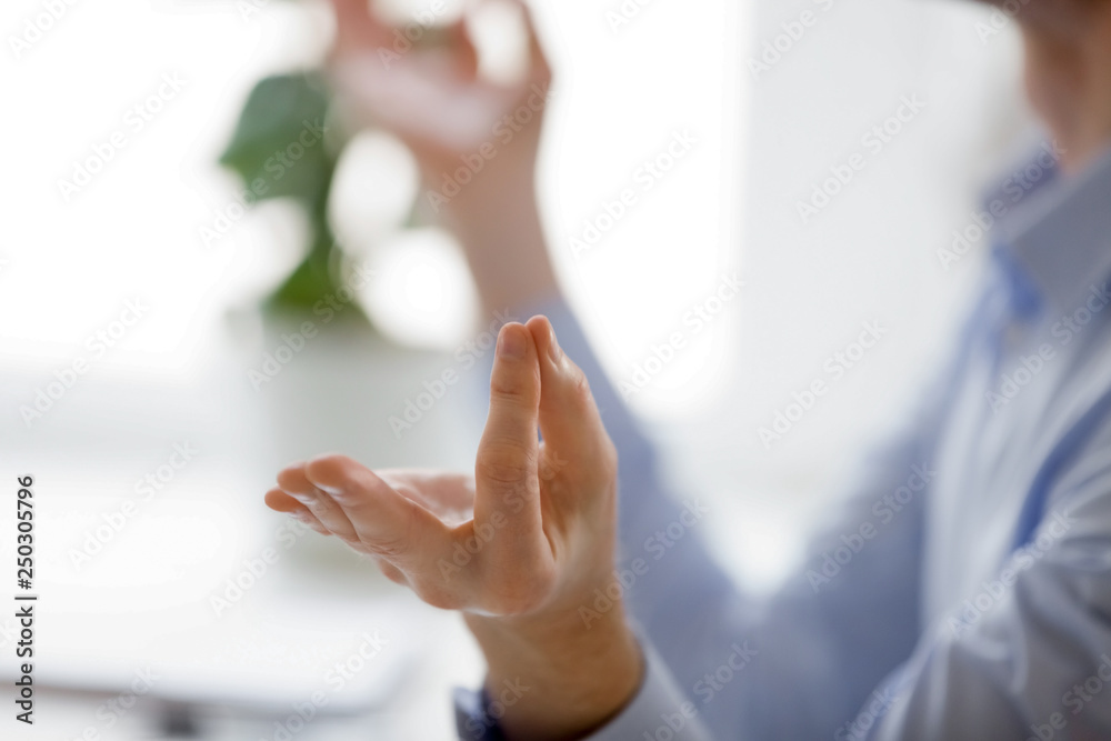 Businessman meditating close up of male hands