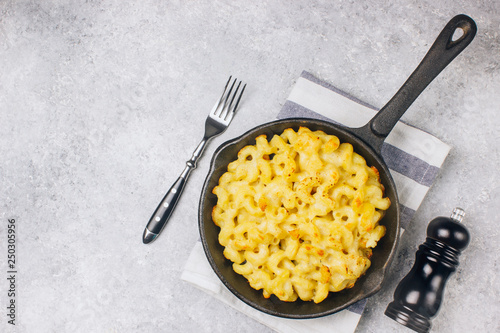 Mac and cheese, american style macaroni pasta with cheesy sauce