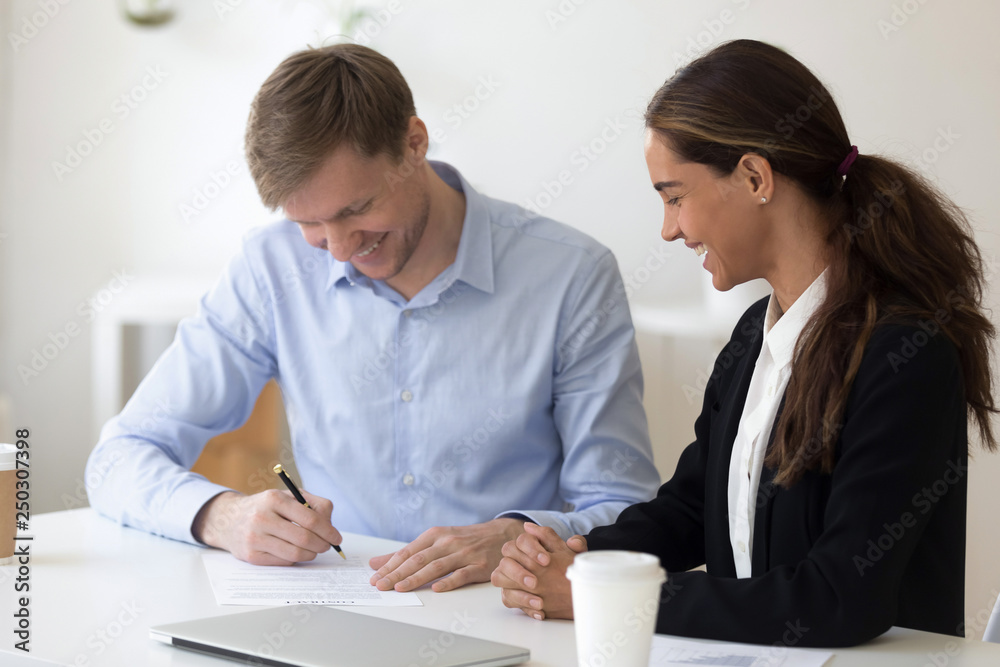 Business partners gathered together for signing contract Business partners gathered together for signing contract