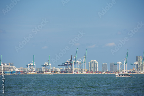 Telehpoto photo Port of Miami cranes harbor