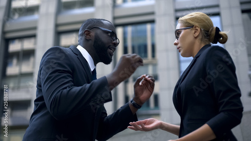 Canvas Print Chief shouting at secretary for bad job, explaining mistake, contract failure