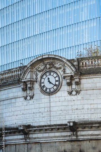 old railway clock on facade of building (ID: 250312103)