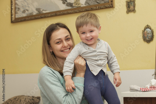 Mom plays with her son