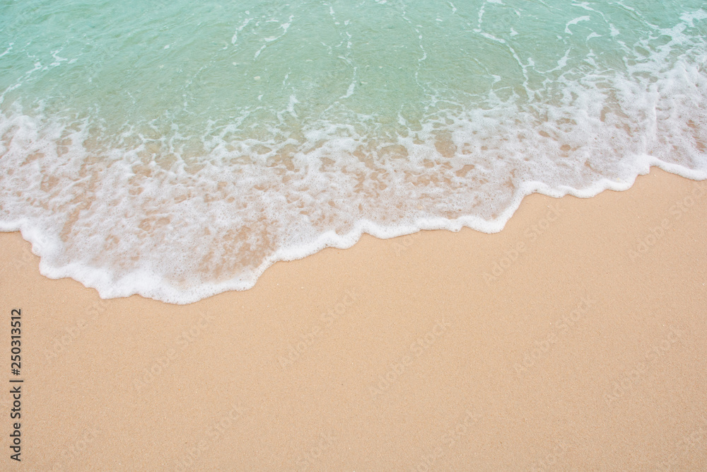 Soft wave of sea on empty sandy beach Background with copy space Soft wave of sea on empty sandy beach Background with copy space