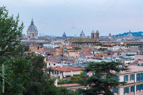 Sunset hour in Rome, Italy with cityscapes and rooftop views
