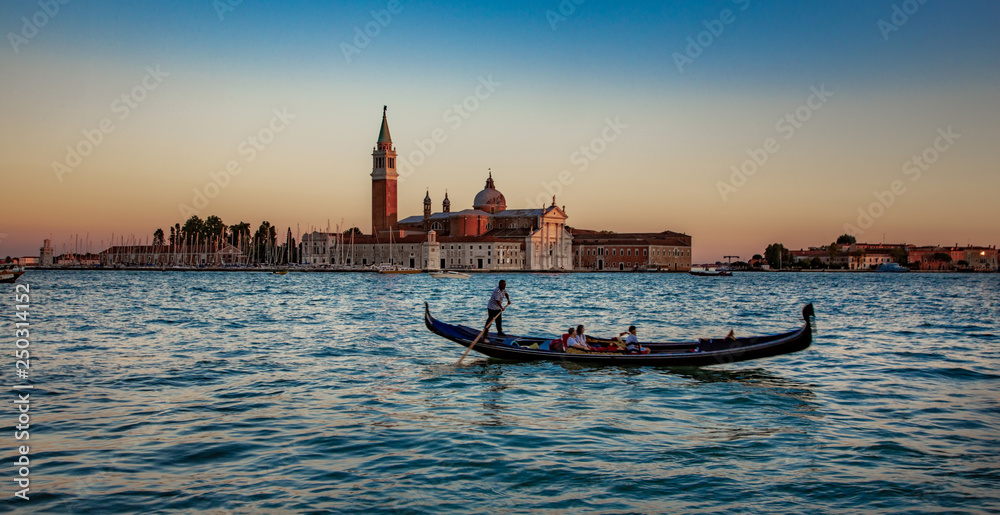 Italy beauty, gondola and San Giorgio Maggiore island in Venice, Venezia