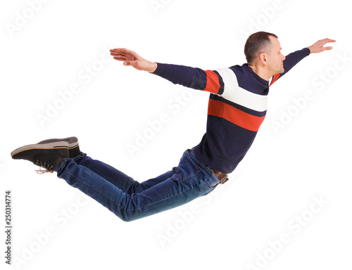Side view of man in zero gravity or a fall.