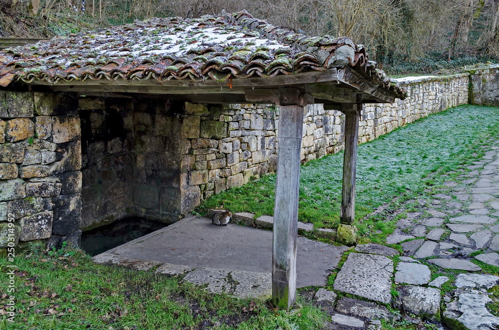 Small corner with roof oven sacred spring source in Demir Baba Teke, cult monument honored by both Christians and Muslims in winter near Sveshtari village, Municipality Isperih, Razgrad Small corner with roof oven sacred spring source in Demir Baba Teke, cult monument honored by both Christians and Muslims in winter near Sveshtari village, Municipality Isperih, Razgrad