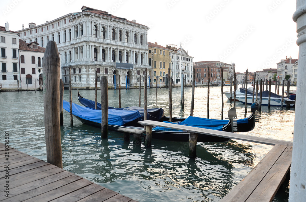 Traditional canal street with gondola in Venice, Italy. View of famous Grand Canal, Venice.