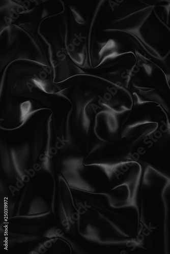 black abstract background luxury cloth or liquid wave or wavy folds of grunge silk texture satin velvet material or luxurious Christmas background or elegant wallpaper design, background