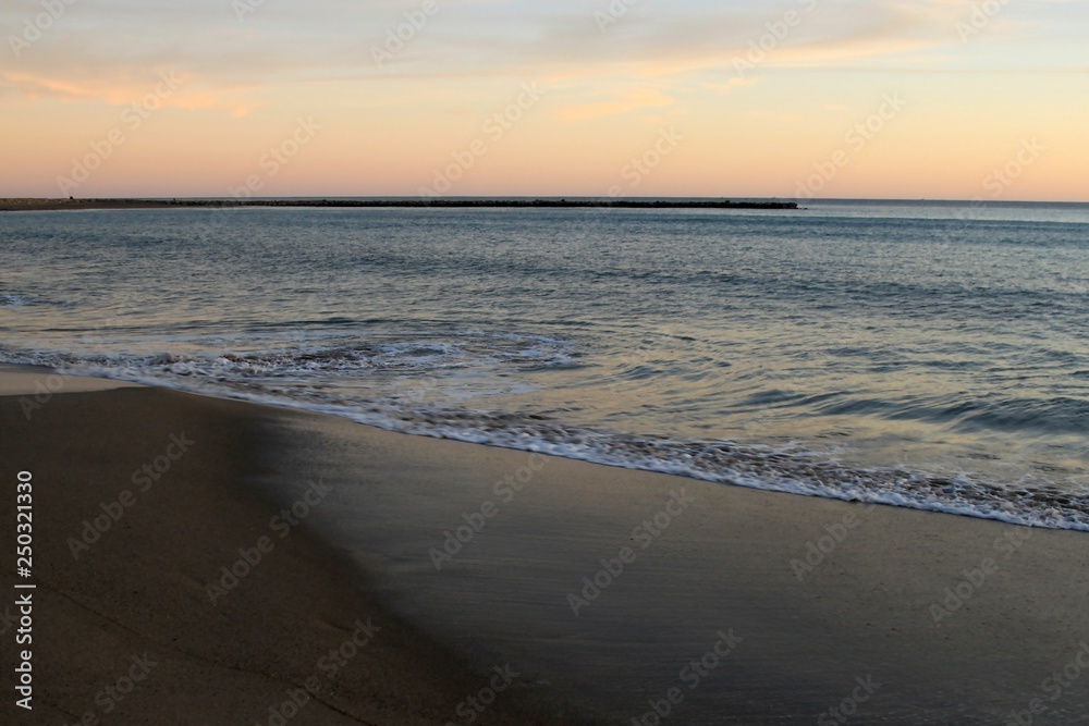 Waves on the beach coast summer heat blue sky sunset water Mediterranean Spain