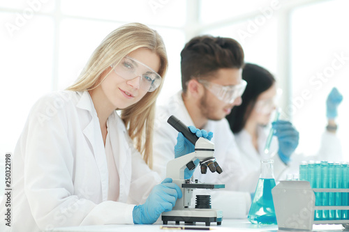 close up.female scientist working in a modern laboratory